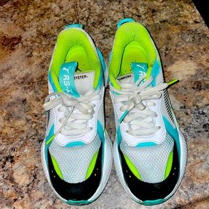 These are pumas SIZE 8.5  colors green, blue, black, and white